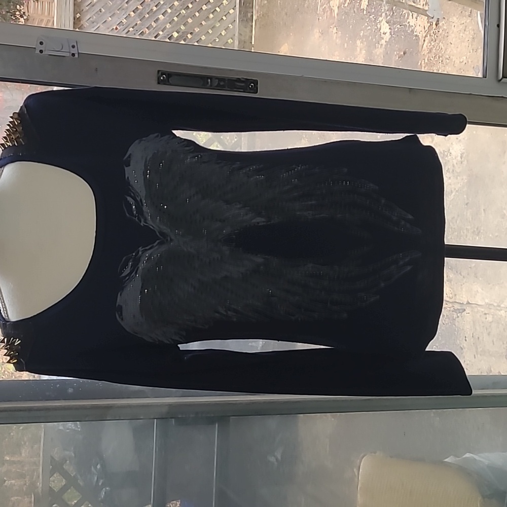 Lely ❤️ Wood angel wing shoulder spike pull over long sleeves.